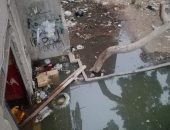 صور.. مياه الصرف الصحى تغرق عمارات أطلس بمدينة نصر