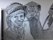 "فنان الصعيد".. حسام يسعى لإقامة معرض فنى للرسم فى سوهاج