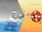 غريق فى بحر السوشيال ميديا يبحث عن طريق الهروب للواقع بكاريكاتير بحرينى