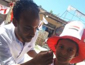 صور.. الجماهير ترسم علم الزمالك على وجوههم قبل نهائى الكونفدرالية