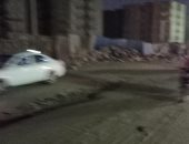 انتشار القمامة بشارع المطحن بشتيل بالجيزة يزعج الأهالى