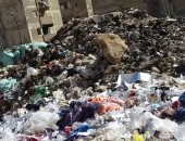 سكان شارع الدكتور فؤاد سعيد بالعمرانية يشكون وجود مقلب للقمامة
