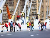 فيديو وصور.. ركوب عجل ورقصات شعبية فى احتفالات العيد أعلى كوبرى روض الفرج