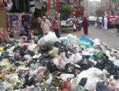 القمامة تسد مدخل شارع "عرابى - طهطا" بمحافظة سوهاج