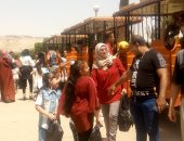 الأطفال يستمتعون بركوب الدراجات والطفطف فى حديقة الفسطاط