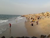 صور .. أهالى شمال سيناء يقبلون على الشواطئ لقضاء ثالث أيام العيد
