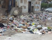 شكوى من انتشار القمامة بمنطقة الوراق بجوار نزلة الدائرى