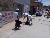 صور.. شباب العريش ينظمون يوما تطوعيا لتنظيف الشوارع والأحياء