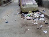 تراكم القمامة بشارع فؤاد الوسطانى بروض الفرج