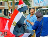 "لك يا مصر السلامة".. الأعلام تغزو الشوارع قبل ساعات من افتتاح كأس الأمم الأفريقية