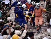 استمرار أعمال فرق الإغاثة لانتشال الضحايا بعد انهيار مبنى فى كمبوديا