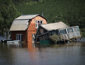 منازل مدمرة نتيجة موجة فيضانات اجتاحت إقليم سيبيريا شرق روسيا