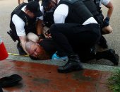 اعتقال شخصين بواشنطن بعد احتجاجات عنيفة وإضرام النار فى العلم الأمريكى