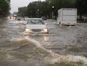 الأمطار تتساقط فى واشنطن.. شاهد تدفق المياه فى الشوارع ومترو الأنفاق