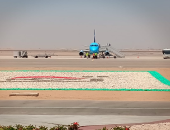 مطار العاصمة الإدارية يستقبل أول رحلة تجريبية لمصر للطيران.. صور