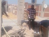 وقف بناء عقار مخالف بالإسكندرية.. وحى الجمرك يتحفظ على مواد البناء