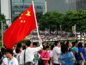 الآلاف من مؤيدى حكومة هونج كونج يتظاهرون للمطالبة بإنهاء العنف فى البلاد