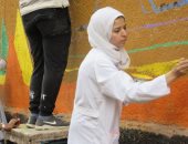 رسوم البهجة.. شباب العياط يشاركون فى حملة لتنظيف المدينة والرسم على الجدران