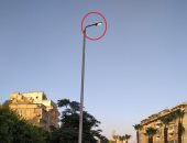 أعمدة الإنارة مضيئة وقت النهار.. شكوى "كريم" من شارع الهرم بالجيزة