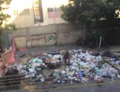 تراكم القمامة فى شارع الدويدار بحدائق القبة يزعج السكان