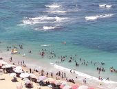 صور.. إقبال متزايد على شواطئ الإسكندرية فى ثالث أيام عيد الأضحى