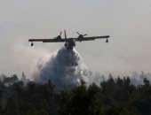 استمرار جهود إطفاء حرائق الغابات فى اليونان بعد امتدادها إلى العاصمة أثينا