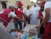 صور .. توزيع مساعدات من الهلال الأحمر على مدارس شمال سيناء 