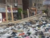 تراكم للقمامة فى شارع النادى بطنطا والأهالى يطالبون بتوفير صناديق