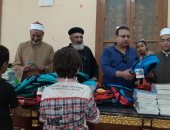 توزيع أدوات مدرسية على 300 تلميذ ضمن مبادرة المسجد والكنيسة ببنى سويف 