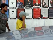 التونسيون يؤيدون مرشحيهم فى الإنتخابات الرئاسية باللافتات وشعارات التأييد 