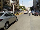 قارئ يشارك بصور لطلاء أرصفة شارع مصدق بالدقى وإزالة الأشغالات