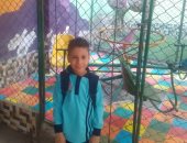 باليونيفورم واللانش بوكس.. قارئ يشارك بصورة ابنه فى أول يوم مدرسة