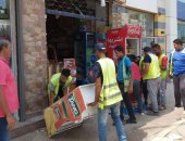 صور.. جهاز 6 أكتوبر يشُن حملة لإزالة التعديات والإشغالات أمام المحال التجارية