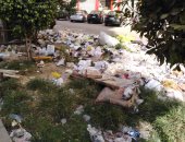 قارئ يشكو تراكم القمامة بشارع المدينة بمصر الجديدة