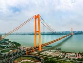 صور.. الصين تفتتح أطول جسر معلق من طابقين فى العالم أمام حركة المرور