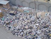 شكوى من تراكم القمامة بمساكن الصعيد فى مدينة النهضة