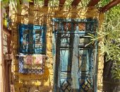"الفن بيتكلم مصرى".. عبير توثق جمال البيوت النوبية والريفية بفن المصغرات