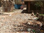 القمامة و مخلفات البناء و مياه الصرف تحاصر سكان حى التفتيش بالفيوم