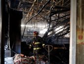 صور..مقتل 3 أشخاص فى حريق متجر وتأجيل رحلات طيران بسبب أعمال الشغب فى تشيلى