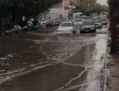 مواطن يشارك بصورة غرق شوارع مصر الجديدة بالخليفة المأمون بمياه الأمطار