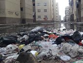 أهالى الرحاب ببورسعيد يشتكون من غرق الشوارع بمياه المجارى.. صور