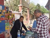 صور.. حملات لضبط الأسواق والتجميل ودهان أعمدة الإنارة بمركز أبو قرقاص بالمنيا