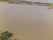 صور.. مصرع أب وابنته غرقا فى مياه السيول وسط سيناء