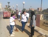 حملات نظافة وتجميل بأحياء مركز القوصية ضمن مبادرة " شارك فى تجميلها "