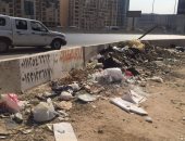 قارئة تشكو من انتشار القمامة بأول طريق القطامية