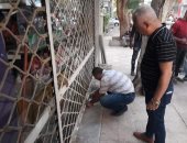 حملات لرفع الإشغالات بالدقى والعجوزة وتطوير شوارع بالعمرانية.. صور