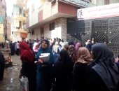 احتفالا بالمولد النبوى الشريف .. توزيع علب الحلوى على أهالى الجيزة