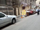 قارئ يرسل شكوى من جراج يحتل أرصفة الشارع ويشغل الطريق