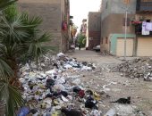 القمامة تتراكم أمام مكتب صحة مساكن الزاوية الحمراء بالقاهرة.. شكوى من مواطن