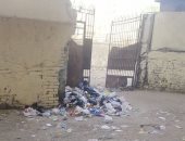 قارئ يشكو من تراكم القمامة بشارع المجمع المدارس فى بشتيل
